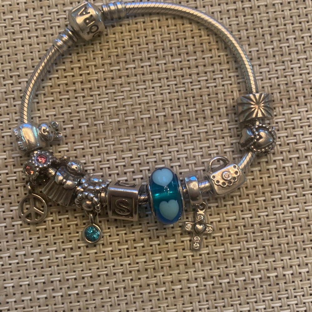 Pandora Silver Charm Bracelet with Blue Accent 9 retired charms and one clip
